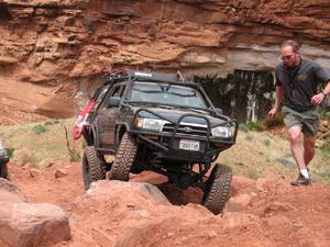Big articulation of the suspension on Kane Creek Trail in Moab, Utah.